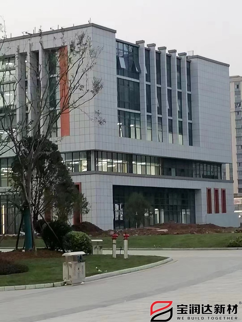 安徽志成中学使用外墙真石漆一体板