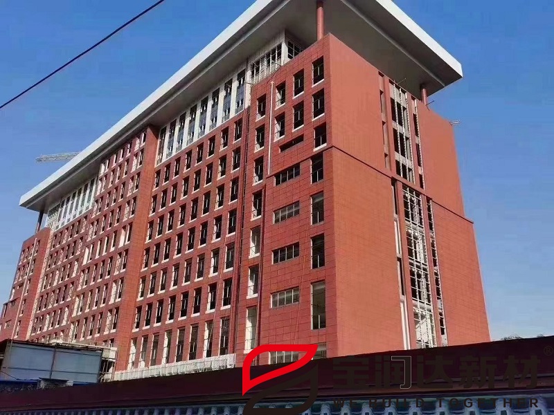 郑州工业技师学院实训楼岩棉真石漆一体板